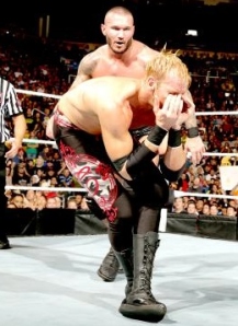 Take that! Christian sells a thumb to eye better than most superstars sell a punch. Image courtesy of WWE.com